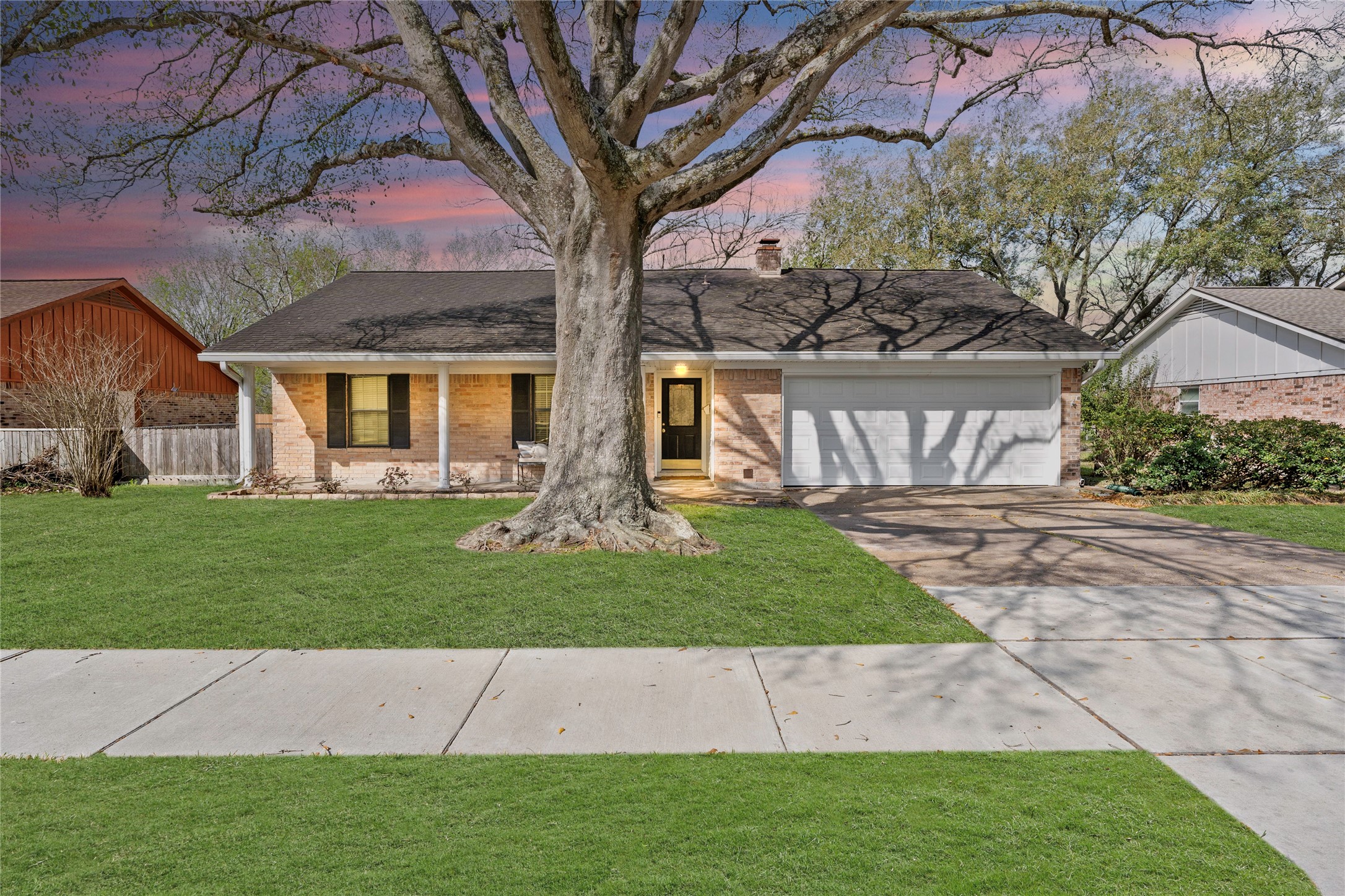 2104 Rose Road Pearland, TX 77581 - Photo 1 of 43 a front view of a house with a yard