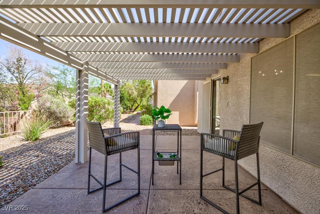 502 Edgefield Ridge Place Henderson, NV 89012 - Photo 33 of 38 View of patio / terrace featuring a pergola