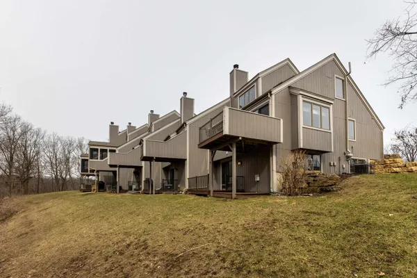a front view of the house with yard