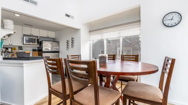 a view of a dining room with furniture window and outside view