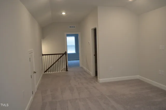 a view of hallway with stairs