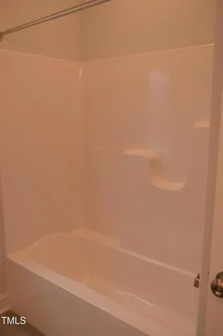 a close up of a bathtub