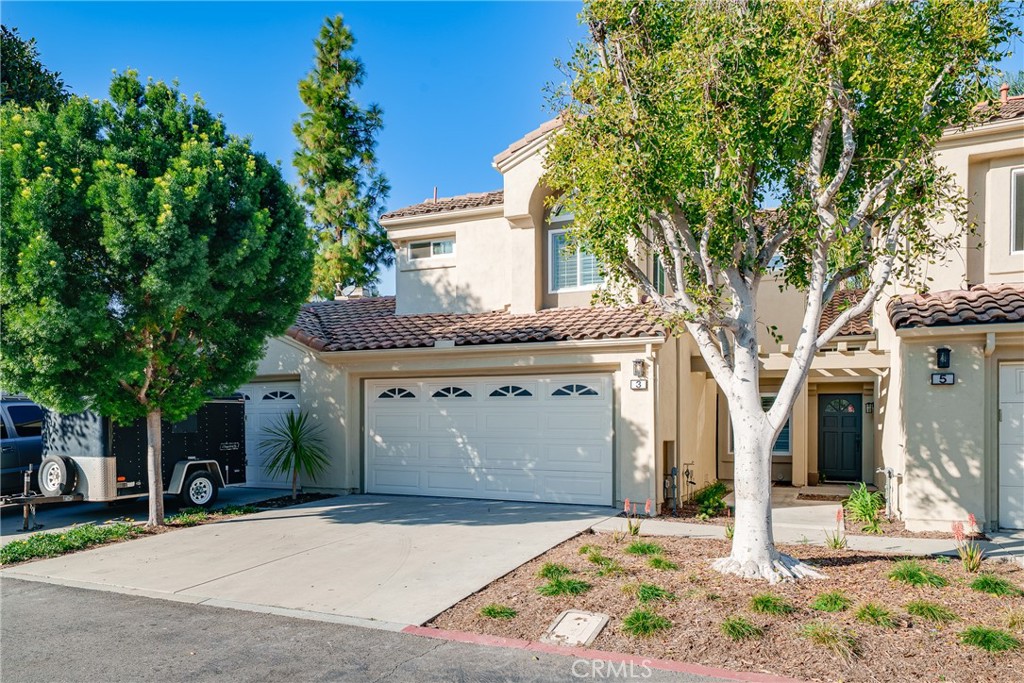 3 Almador Irvine, CA 92614 - Photo 18 of 35 a front view of a house with garden