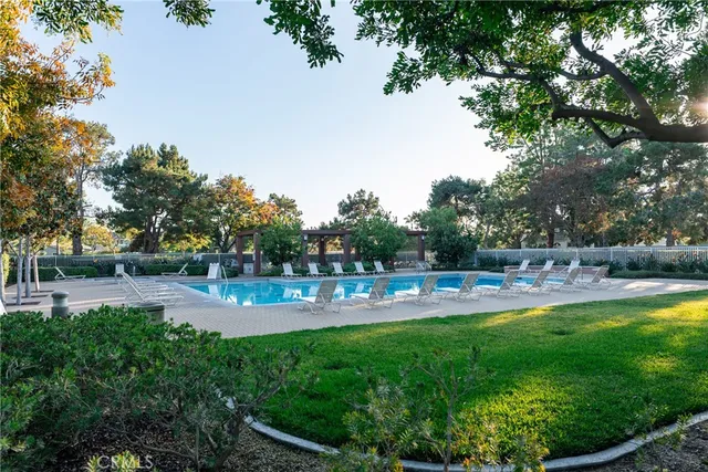 a view of a swimming pool with a patio