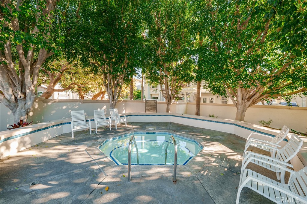 3 Almador Irvine, CA 92614 - Photo 31 of 35 a view of a swimming pool with a patio