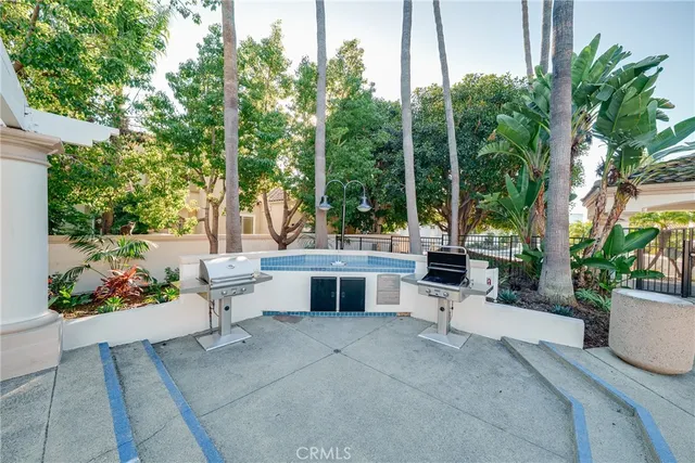 a huge green field with lots of trees