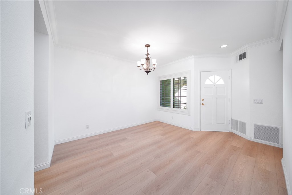 3 Almador Irvine, CA 92614 - Photo 7 of 35 wooden floor in an empty room with a window