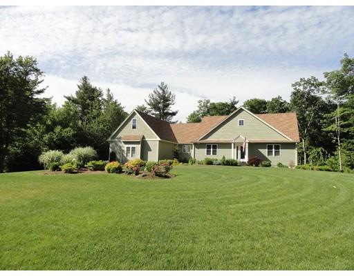 2 Lowry Lane Rutland, MA 01543 - Photo 1 of 30 a front view of a house with a yard