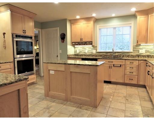 2 Lowry Lane Rutland, MA 01543 - Photo 11 of 30 a kitchen with stainless steel appliances granite countertop a stove a sink and a microwave