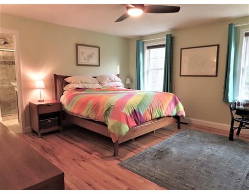 2 Lowry Lane Rutland, MA 01543 - Photo 22 of 30 a bedroom with a bed and a table