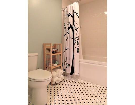 2 Lowry Lane Rutland, MA 01543 - Photo 26 of 30 a bathroom with a sink a toilet and shower