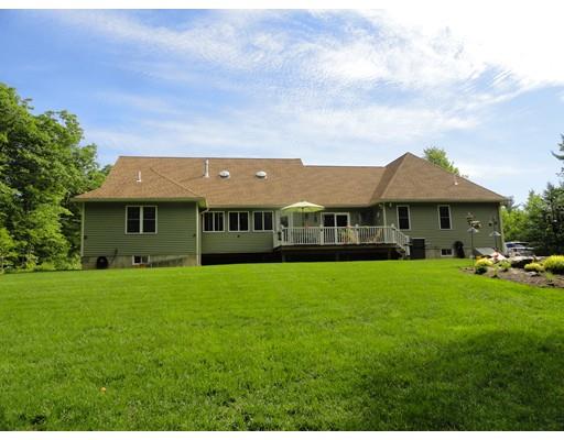 2 Lowry Lane Rutland, MA 01543 - Photo 5 of 30 a front view of a house with a garden