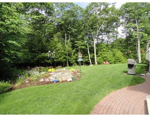 2 Lowry Lane Rutland, MA 01543 - Photo 6 of 30 a view of a backyard with a garden