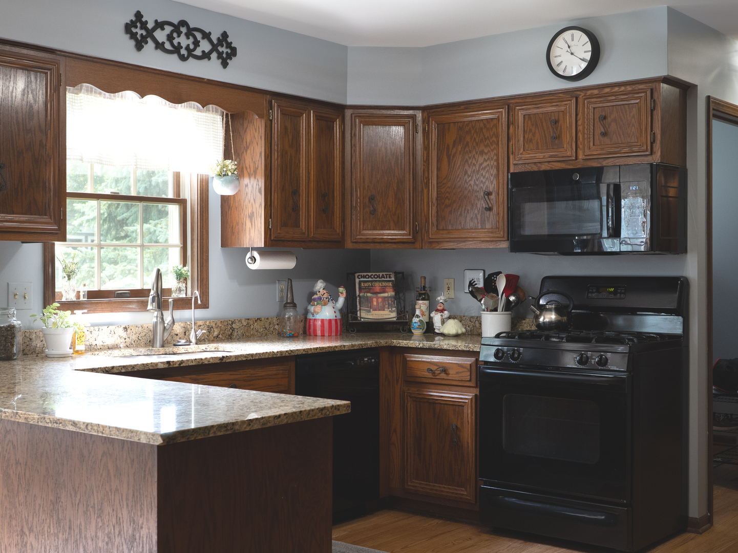 1525 Forest Ridge Road St. Charles, IL 60174 - Photo 5 of 17 a kitchen with a sink a stove and cabinets