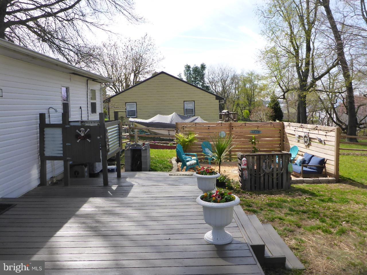43 Arden Road North East, MD 21901 - Photo 12 of 30 Large rear deck with outside shower and fire pit.