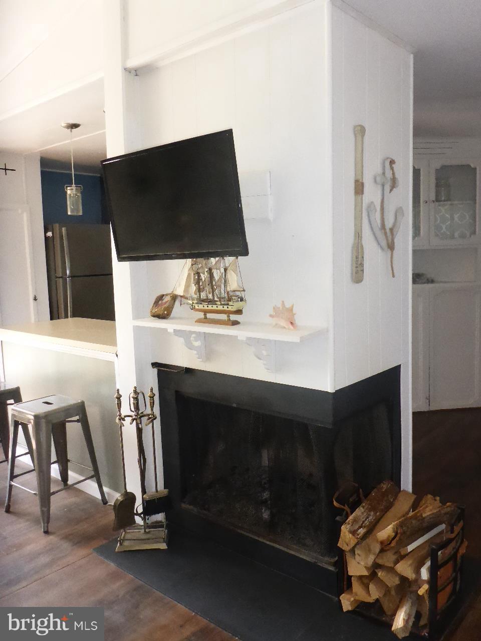 43 Arden Road North East, MD 21901 - Photo 7 of 30 Corner Wood Burning Fireplace