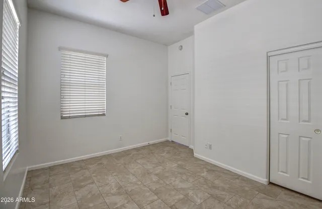 an empty room with windows