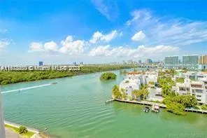a view of a lake with a big yard