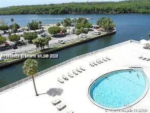 a view of a lake with a house