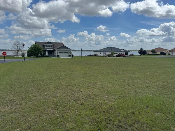 a view of a lake in middle of the town