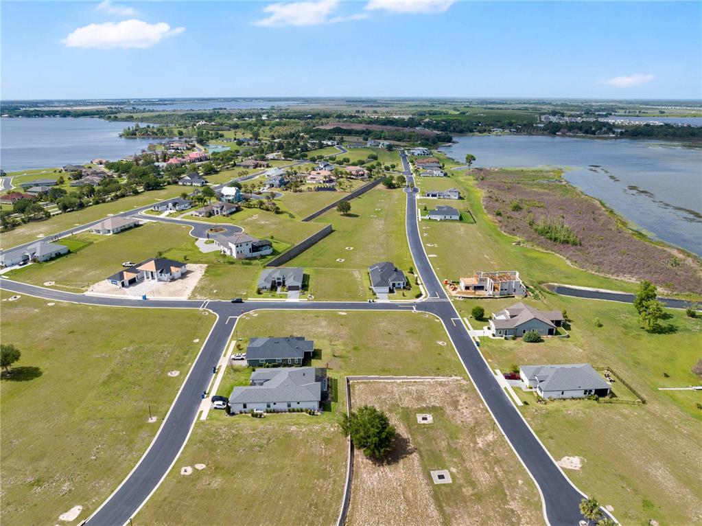 285 Caladium Avenue Lake Alfred, FL 33850 - Photo 12 of 17 an aerial view of a residential houses with outdoor space