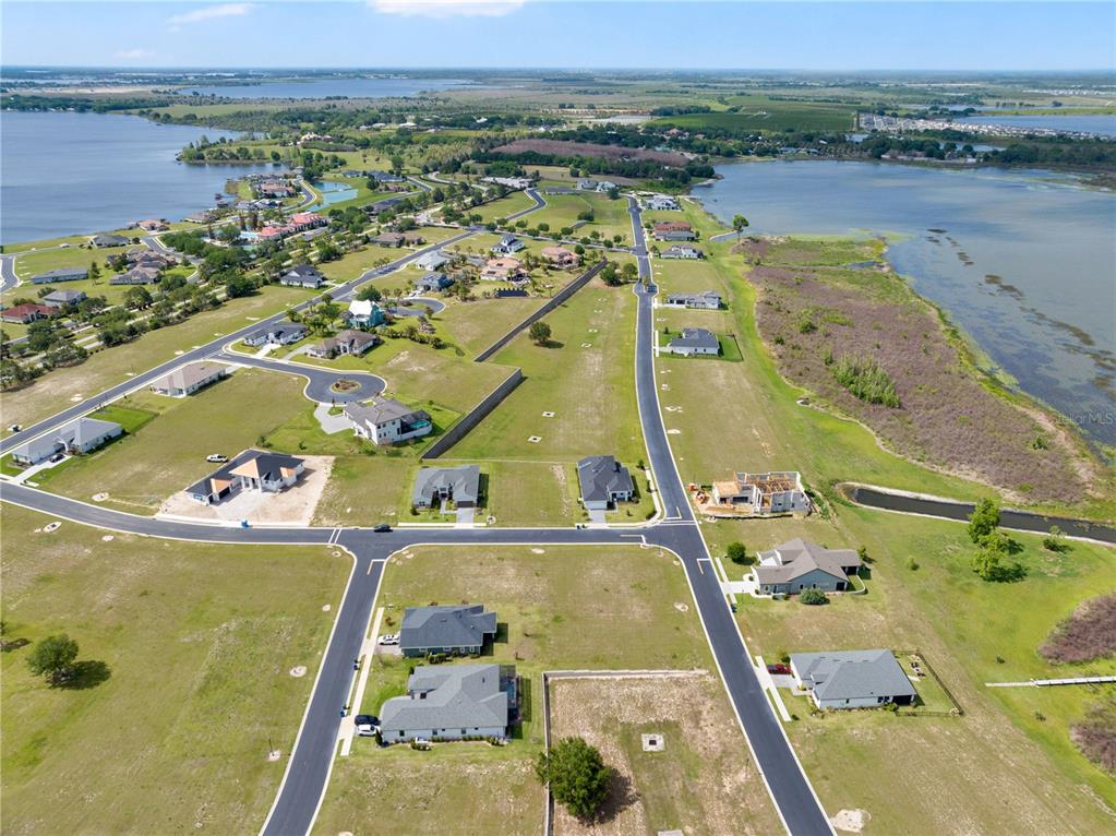285 Caladium Avenue Lake Alfred, FL 33850 - Photo 15 of 17 an aerial view of a house with a ocean view