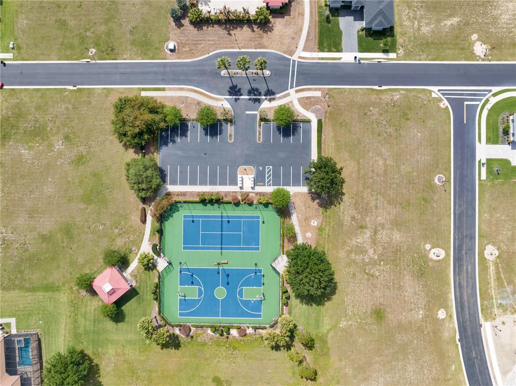 285 Caladium Avenue Lake Alfred, FL 33850 - Photo 17 of 17 a view of swimming pool with a dining table and chairs