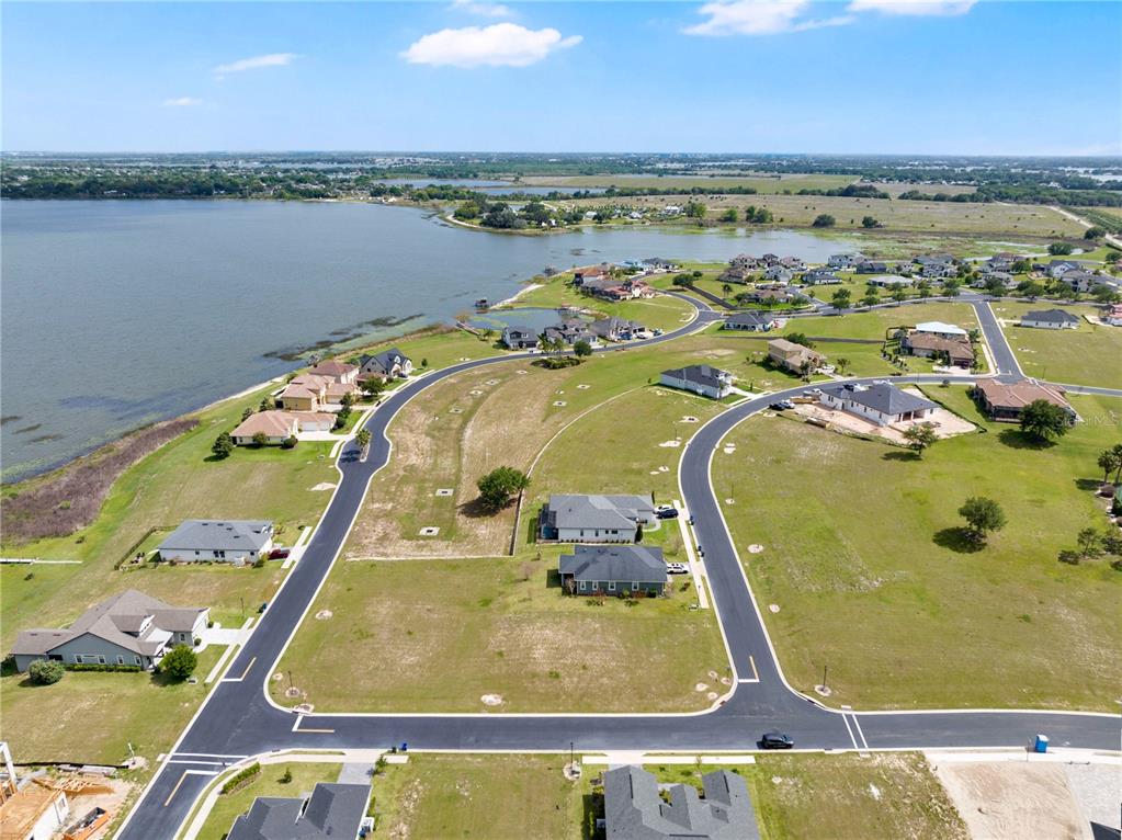 285 Caladium Avenue Lake Alfred, FL 33850 - Photo 5 of 17 an aerial view of a pool patio swimming pool and outdoor space
