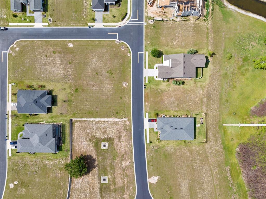 285 Caladium Avenue Lake Alfred, FL 33850 - Photo 9 of 17 aerial view of a swimming pool