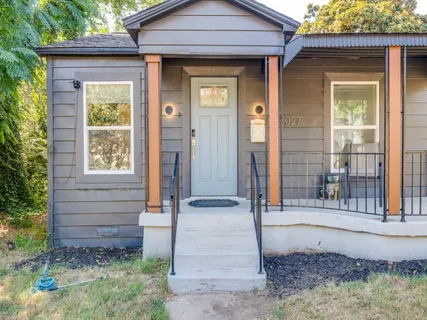 a front view of a house with a porch