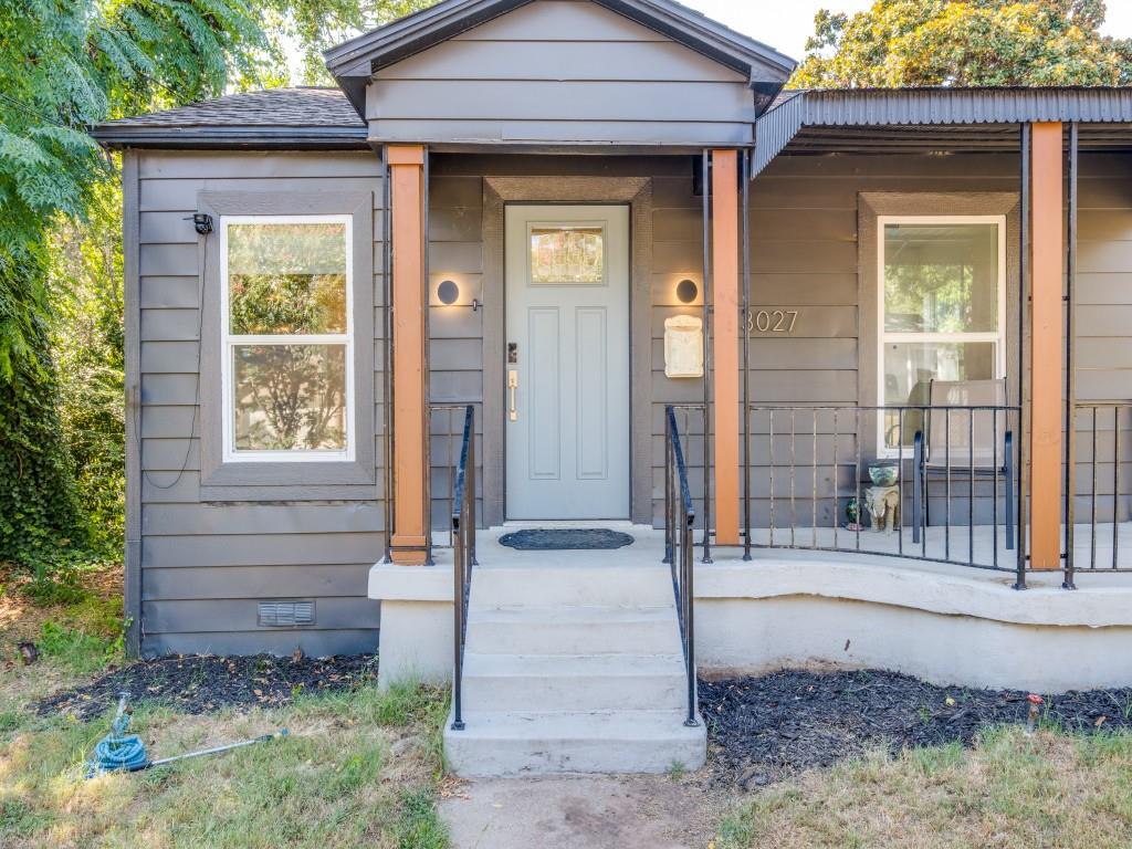 a front view of a house with a porch