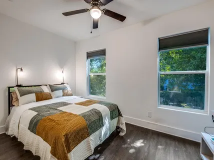 a bathroom with a bathtub and shower