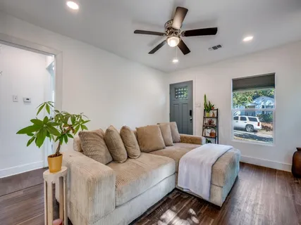 a bedroom with a bed furniture and a window