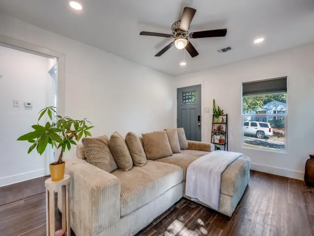 a bedroom with a bed furniture and a window