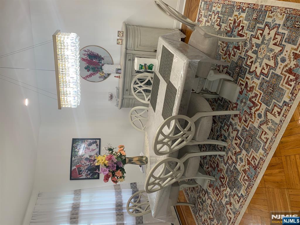 272 Wilson Avenue Fairview, NJ 07022 - Photo 6 of 15 a view of a dining room with furniture