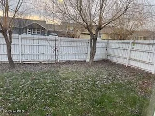 a kitchen with a table and chairs in it