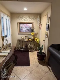 a room with furniture and paintings on the wall