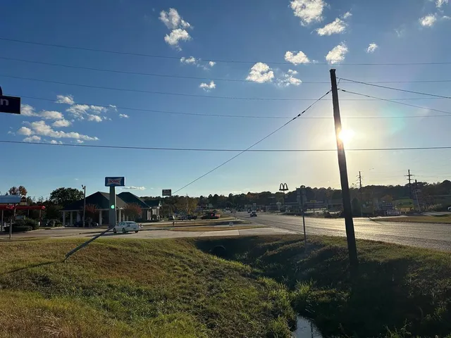 a view of a road with an ocean view