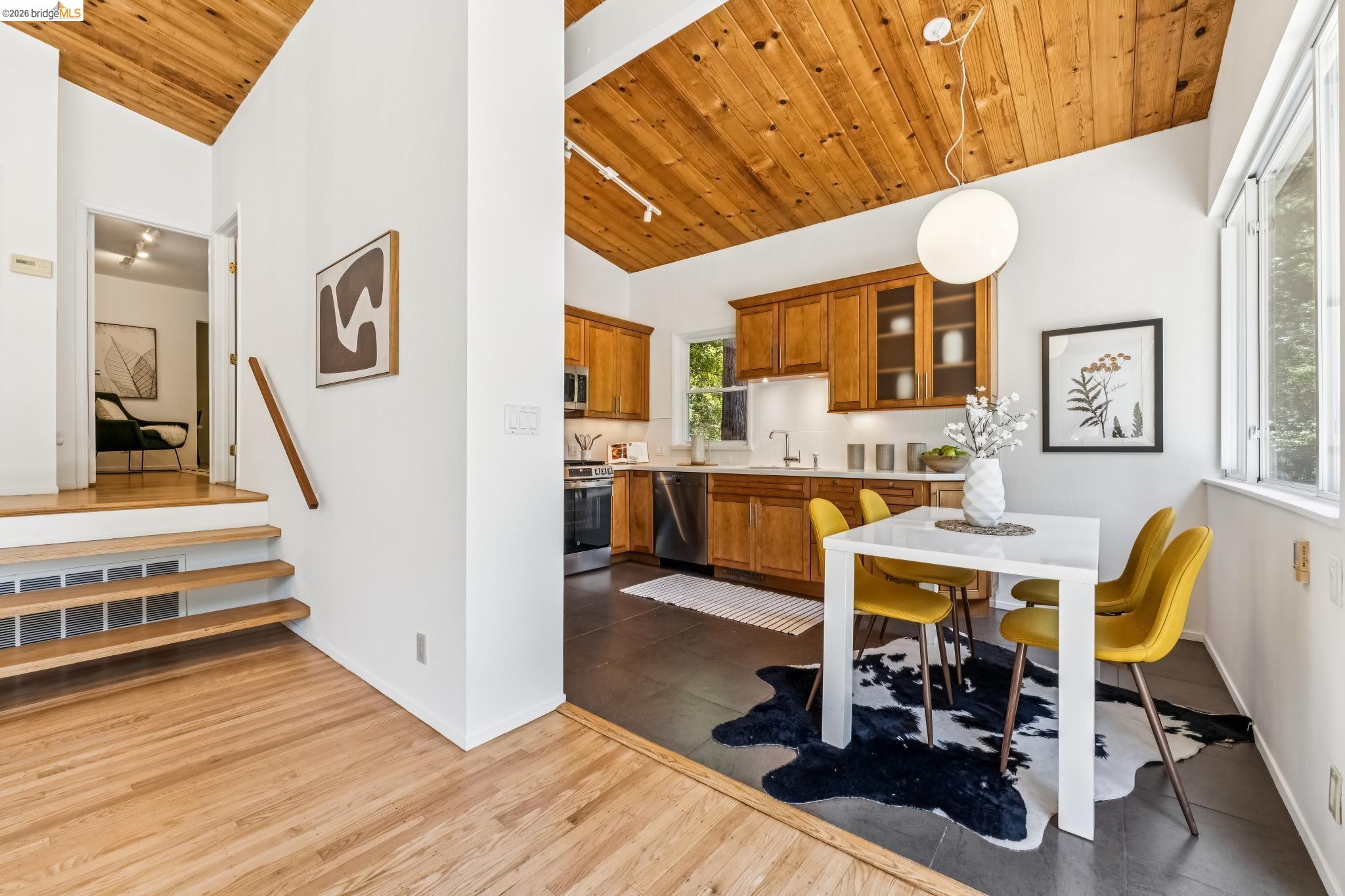 6645 Heather Ridge Way Oakland, CA 94611 - Photo 60 of 61 Vaulted wood-paneled ceiling accentuates the open floor plan
