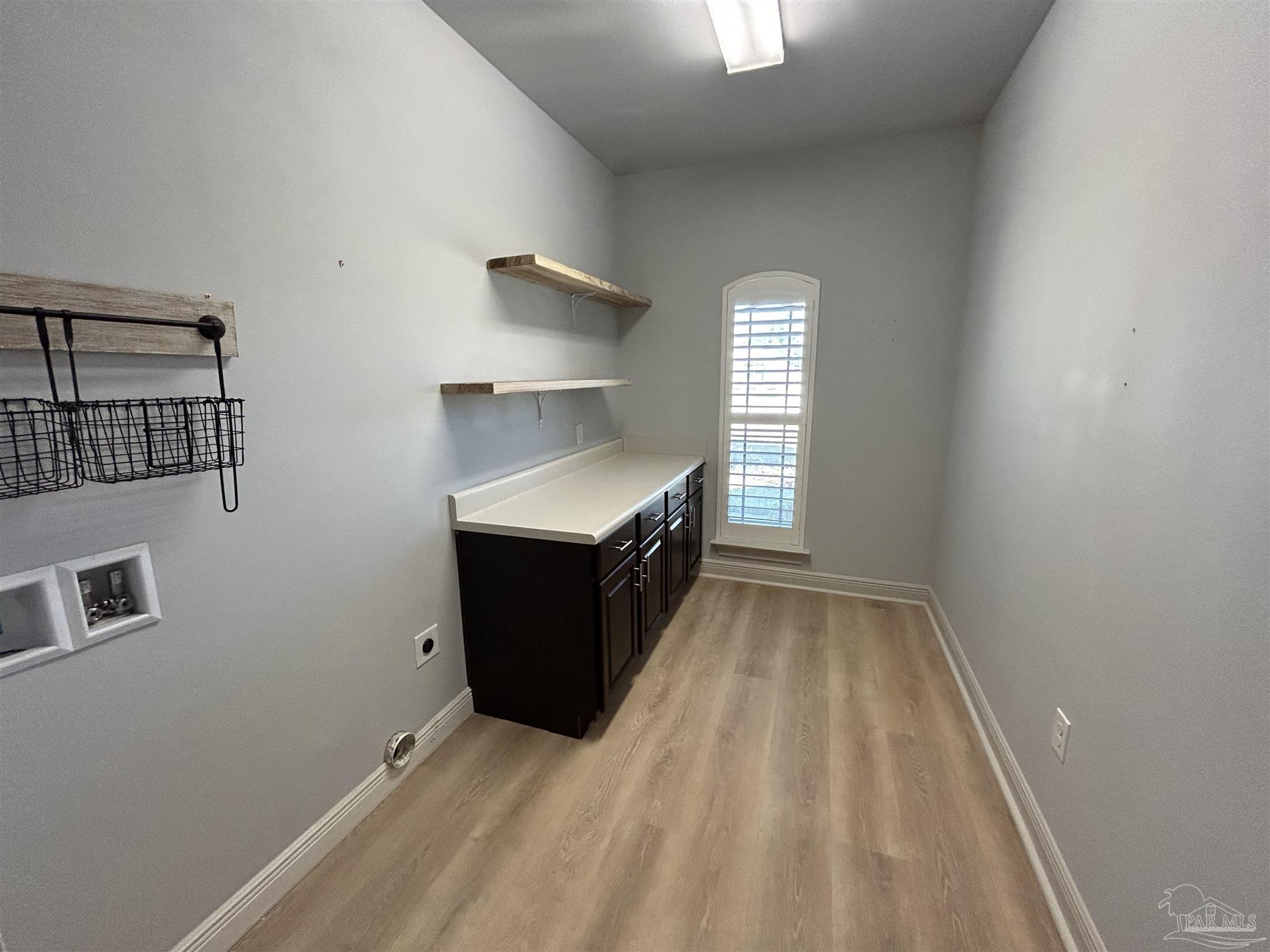 4081 Manchester Court Pace, FL 32571 - Photo 20 of 34 a room with window and ceiling fan