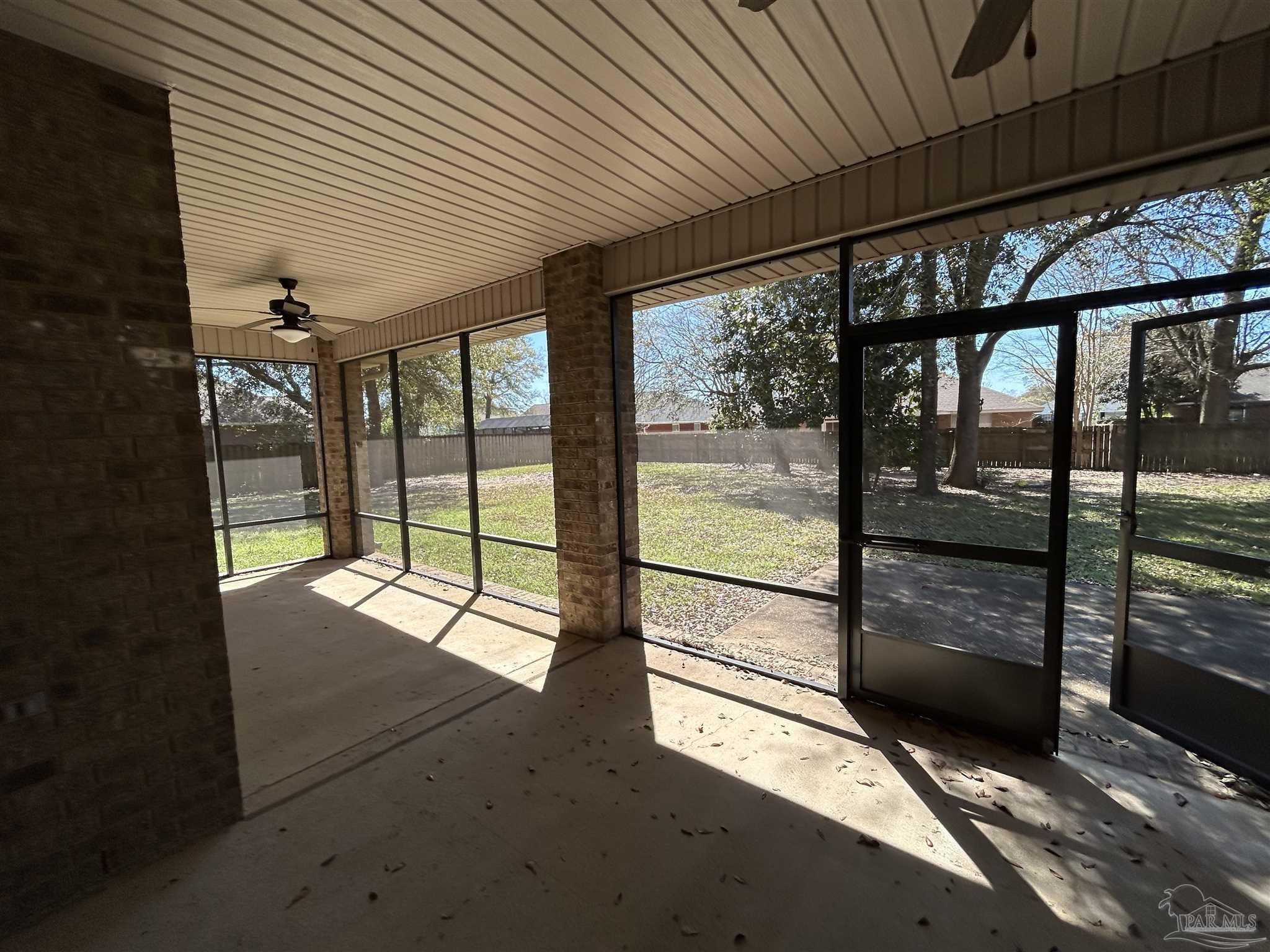 4081 Manchester Court Pace, FL 32571 - Photo 30 of 34 a view of a porch with a wooden floor