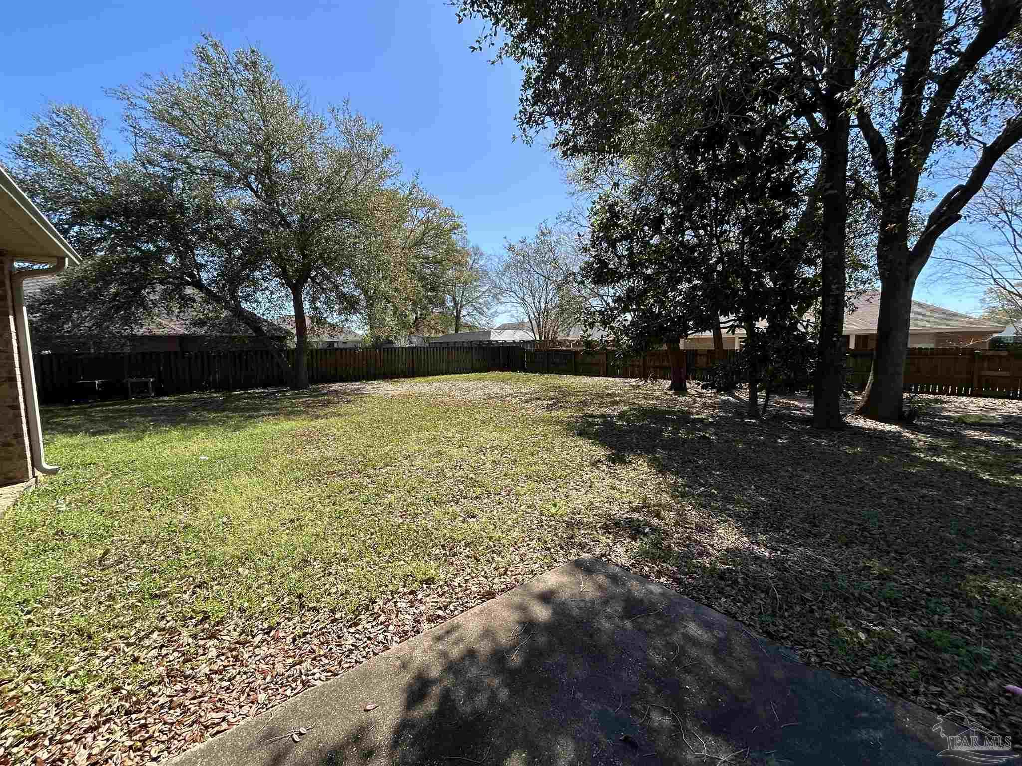 4081 Manchester Court Pace, FL 32571 - Photo 33 of 34 a view of outdoor space with trees all around