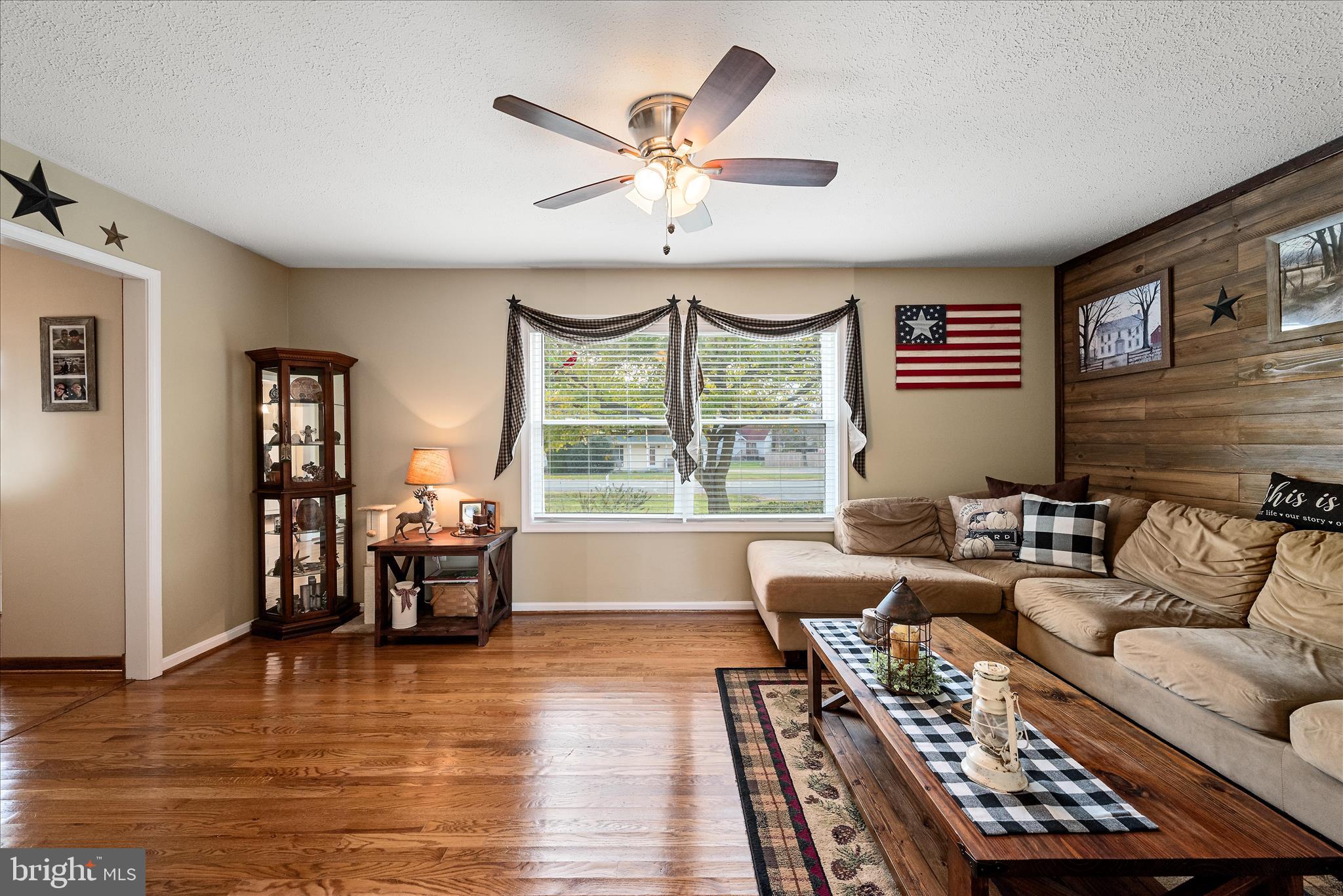 207 Killdeer Road Stephens City, VA 22655 - Photo 15 of 39 a living room with furniture and a large window