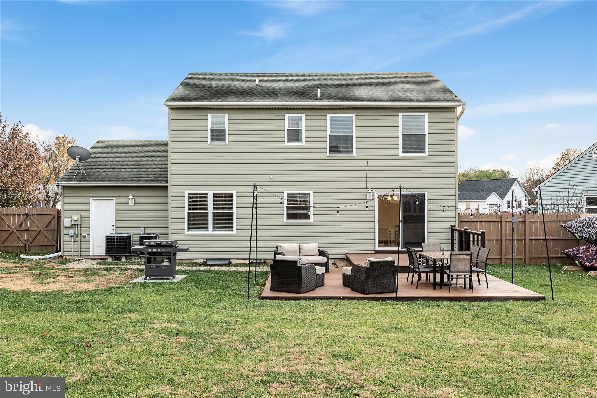 207 Killdeer Road Stephens City, VA 22655 - Photo 35 of 39 a backyard of a house with table and chairs