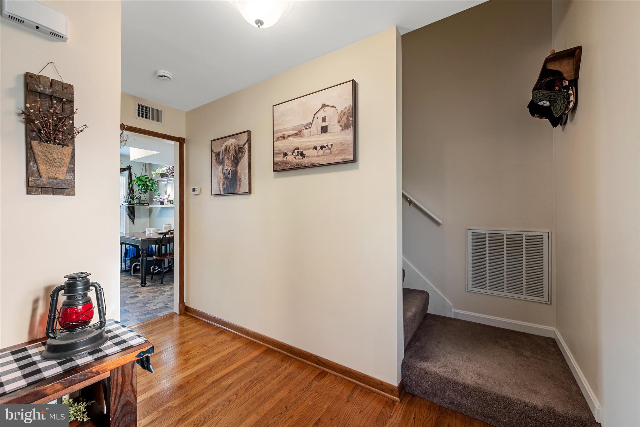 207 Killdeer Road Stephens City, VA 22655 - Photo 5 of 39 a view of a workspace with furniture and wooden floor