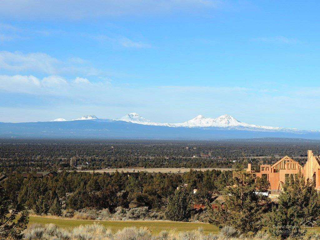 16343 Southwest Brasada Rnch Road Powell Butte, OR 97753 - Photo 9 of 18 a view of a city with mountains in the background