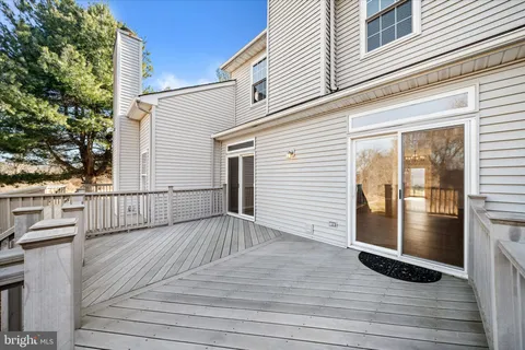 a view of wooden floor with a balcony