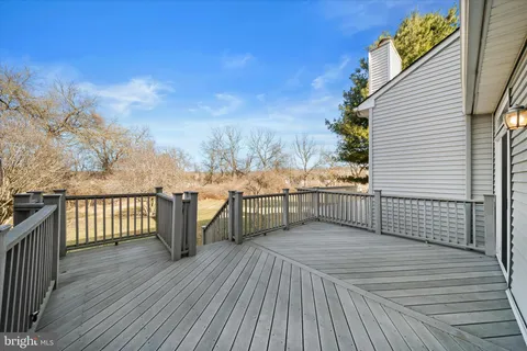 a view of a terrace with trees