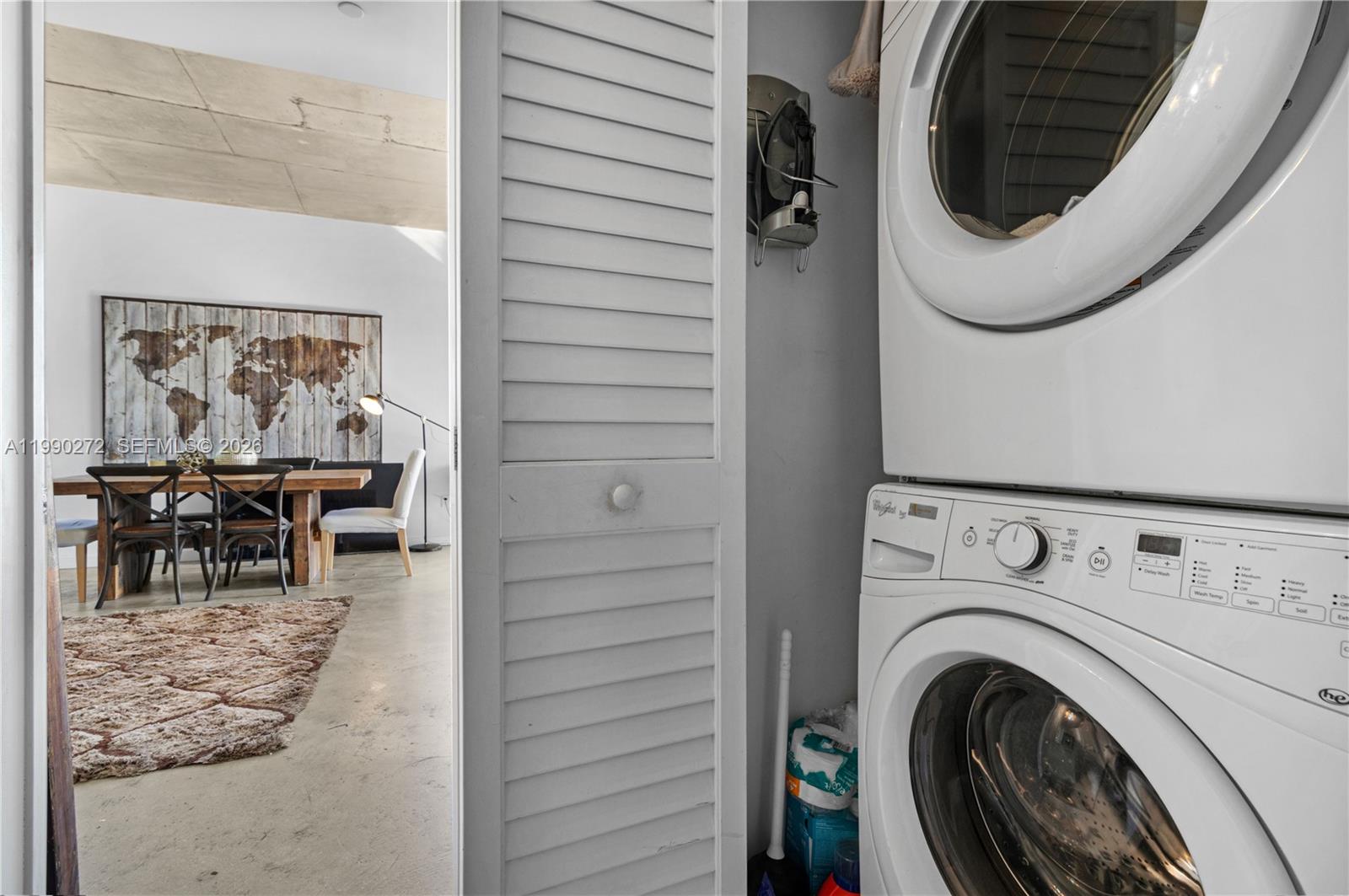 151 Southeast 1st Street, Unit 2802 Miami, FL 33131 - Photo 20 of 31 a utility room with dryer and washer