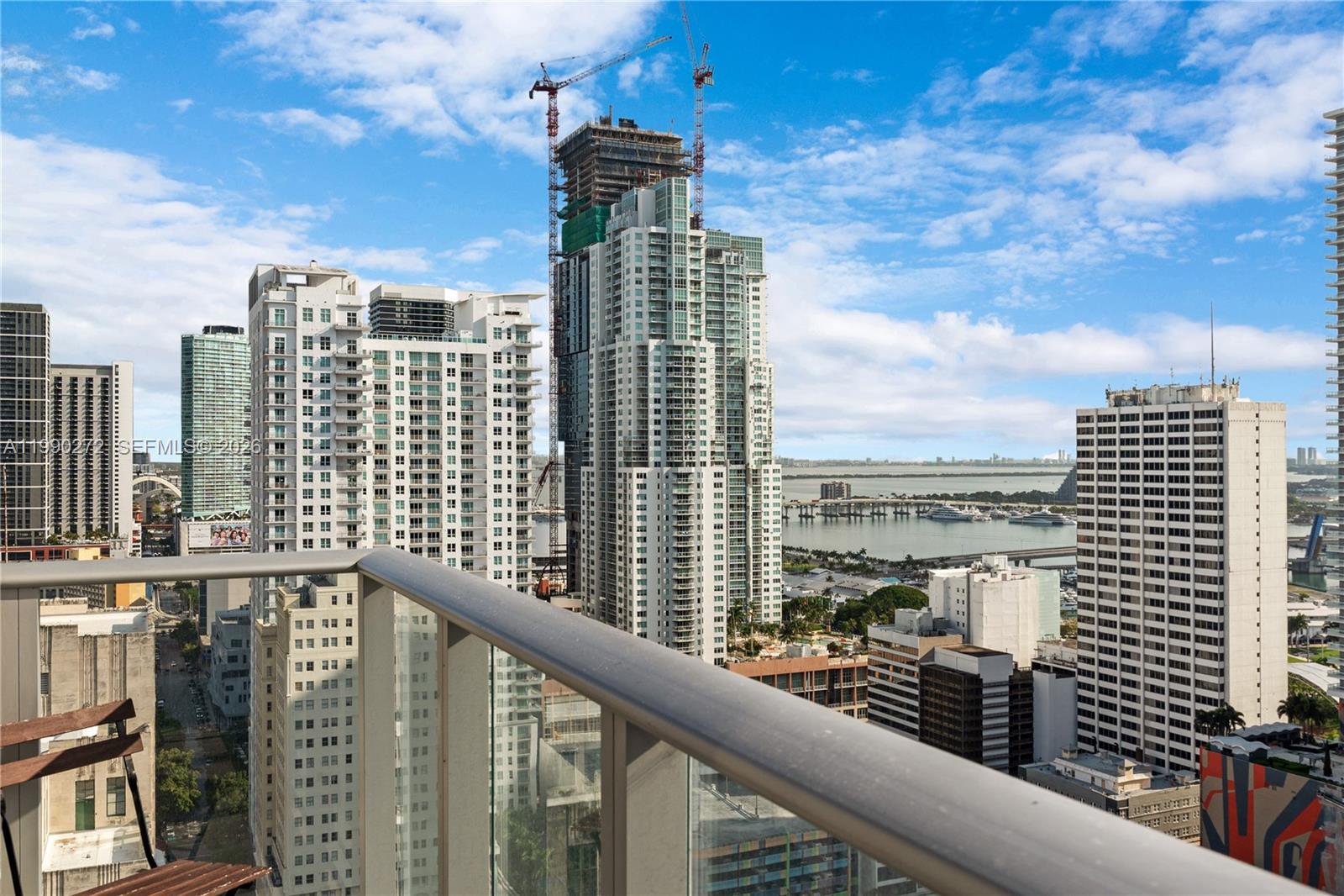 151 Southeast 1st Street, Unit 2802 Miami, FL 33131 - Photo 22 of 31 a city view from a balcony